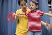 Case of five-year-old child: Wang Sum is doing a “Making X” exercise.